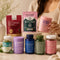 ellasie supplement range with a brunet woman in a marble counter