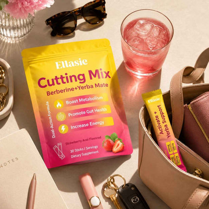 Ellasie Cutting Mix dietary supplement pouch in yellow and pink packaging, styled on a beige tabletop with sunglasses, a pink drink, a handbag, keys, and other lifestyle props.