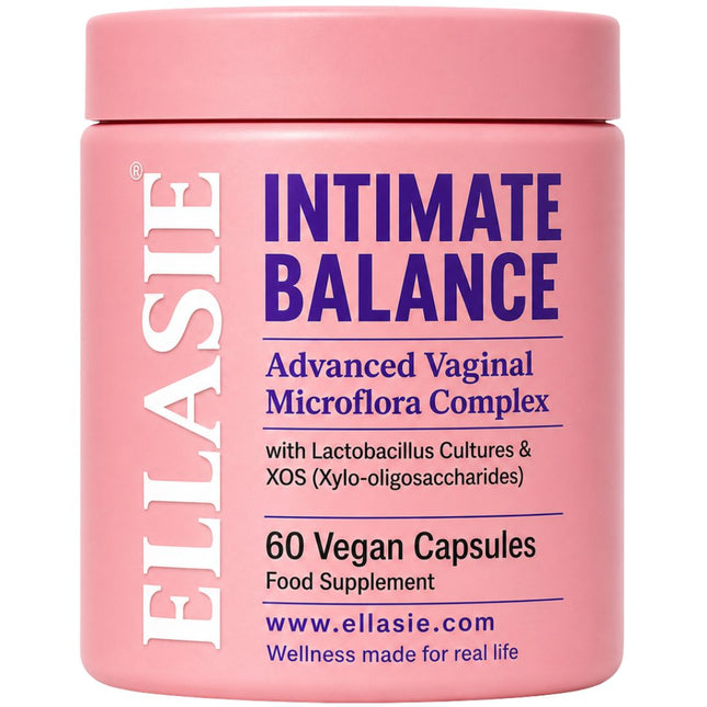 A pink cylindrical plastic jar of ELLASIE Intimate Balance food supplement with a matching pink lid, featuring purple and white text on a white background.