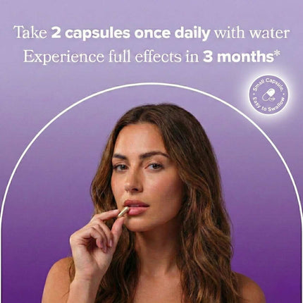 Woman holding a Juicy V-Care vegan capsule