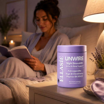 Woman reading beside Ellasie Unwire PM evening capsules